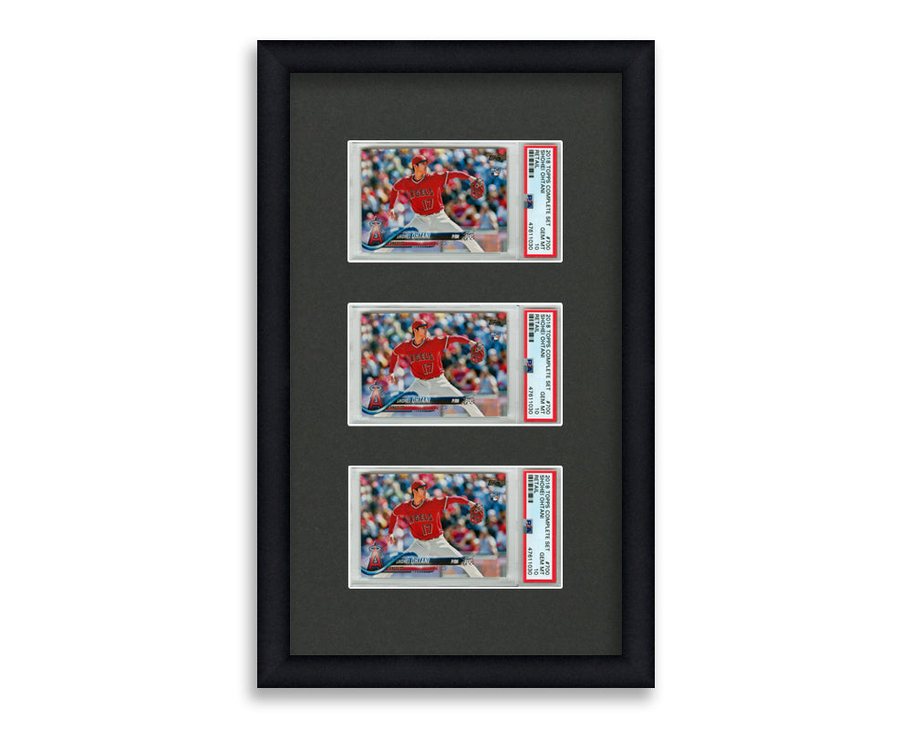 PSA Framed Card Display holds 3 horizontal PSA graded slabs in a 3 up layout with a black background and black frame