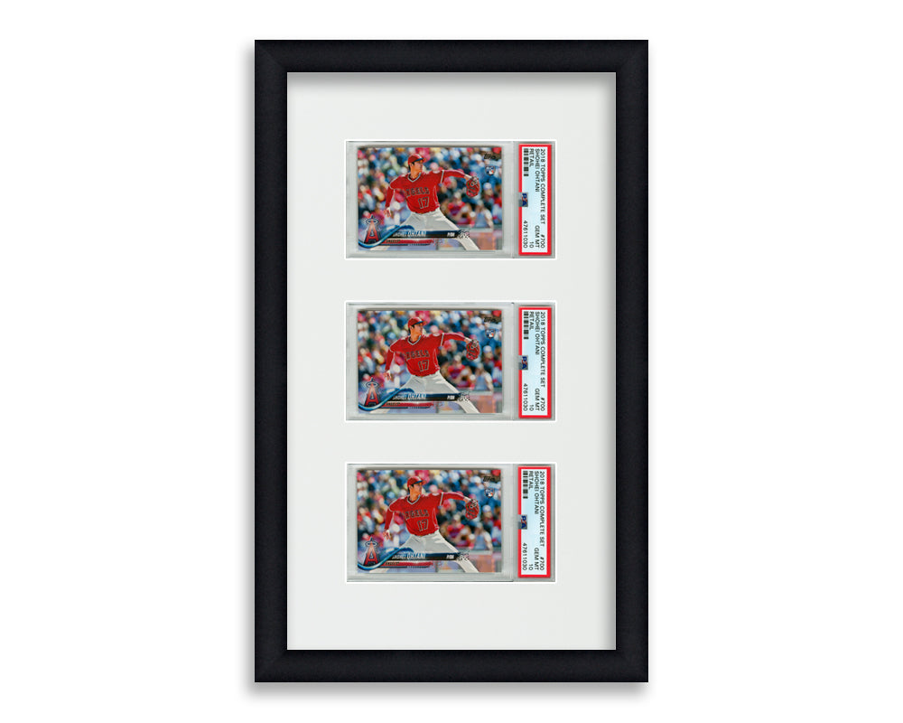 PSA Framed Card Display holds 3 horizontal PSA graded slabs in a 3 up layout with a white background and black frame